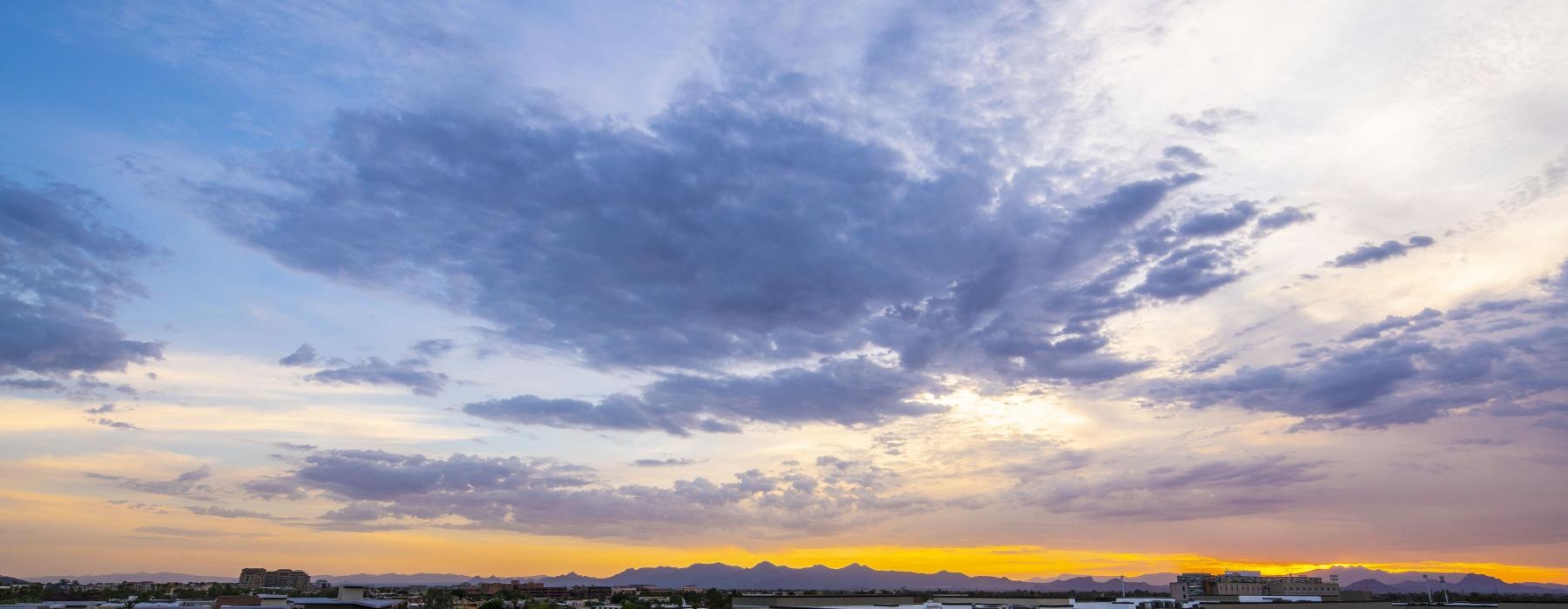 a sunset with clouds