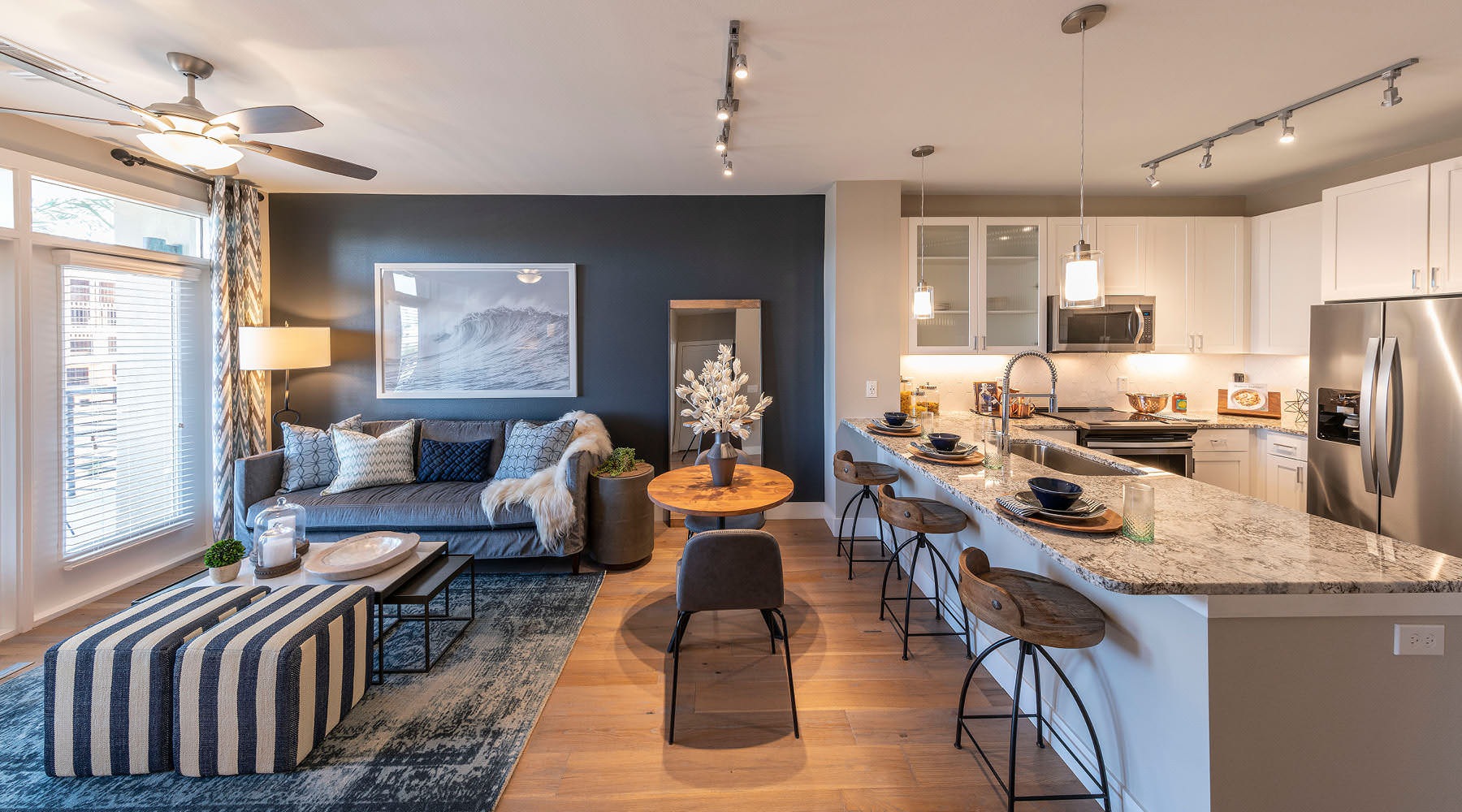 Experience Life at Carter large kitchen with open counter facing living room